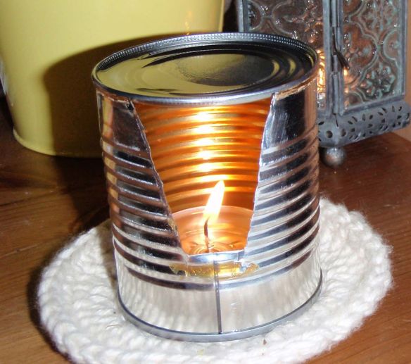 Check this out - an oil burner made from a can - pic via www.instructables.com